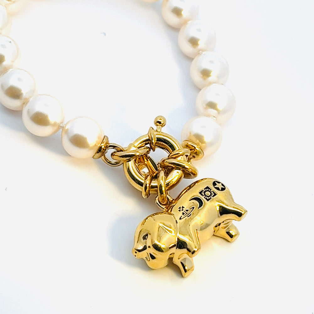 
                      
                        Vivienne Westwood Juanita Gold Tone and Pearl Bracelet
                      
                    