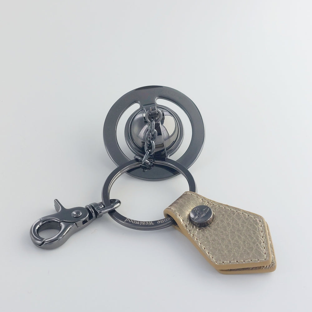 
                      
                        Vivienne Westwood Gold Grain Leather 3D Orb Gunmetal Keyring
                      
                    