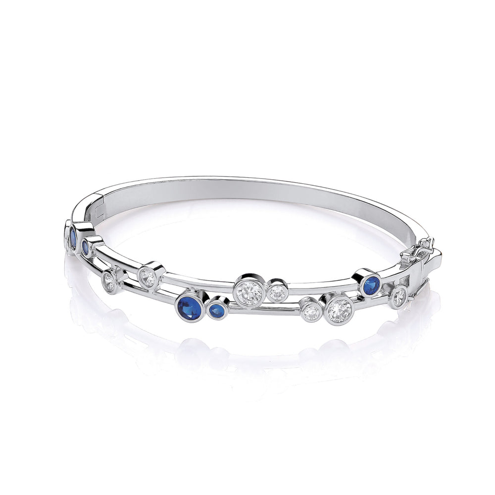 Coe & Co Sterling Silver Timeless Rubover set Blue & Clear CZs Ladies Bangle