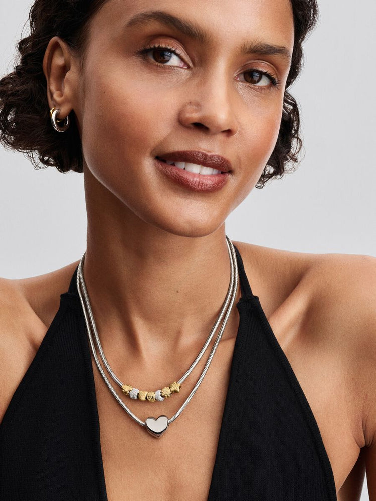 
                      
                        Pandora Textured Shell Mini Charm
                      
                    