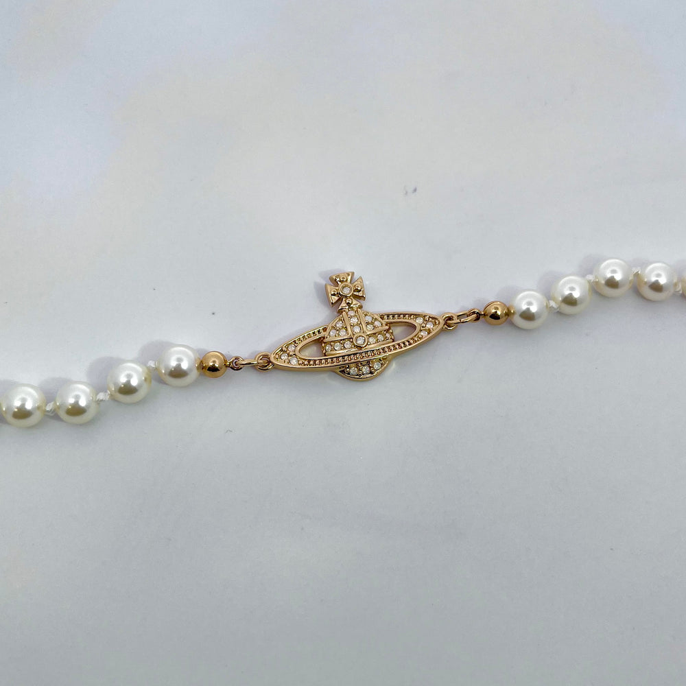 Vivienne Westwood Mini Bas Relief Pearl Bracelet Yellow Gold White Opal