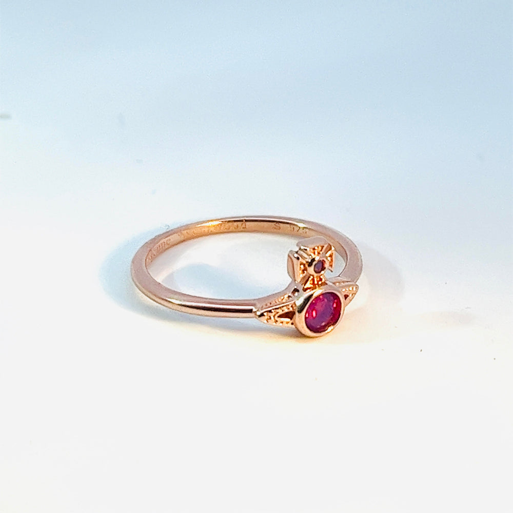 
                      
                        Vivienne Westwood London Orb Rose Gold and Purple CZ Ring
                      
                    